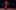 Woman dancing in red flamenco dress